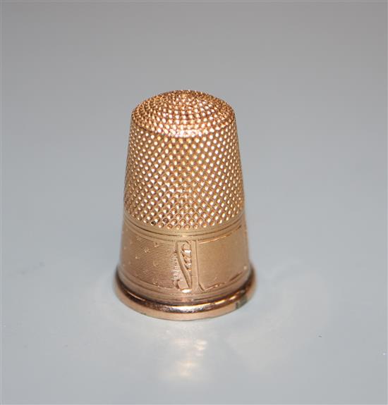 A cased French engraved 18ct yellow metal thimble, 22mm.